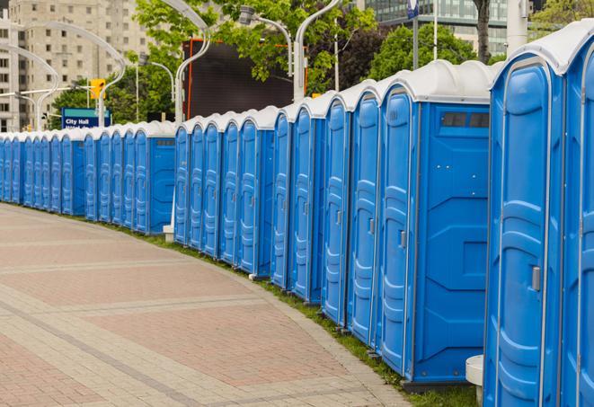 a row of portable restrooms at a fairground, offering visitors a clean and hassle-free experience in sunbury